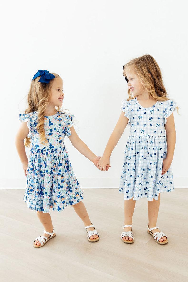 BLUEBERRY PICNIC FLUTTER SLEEVE TWIRL DRESS