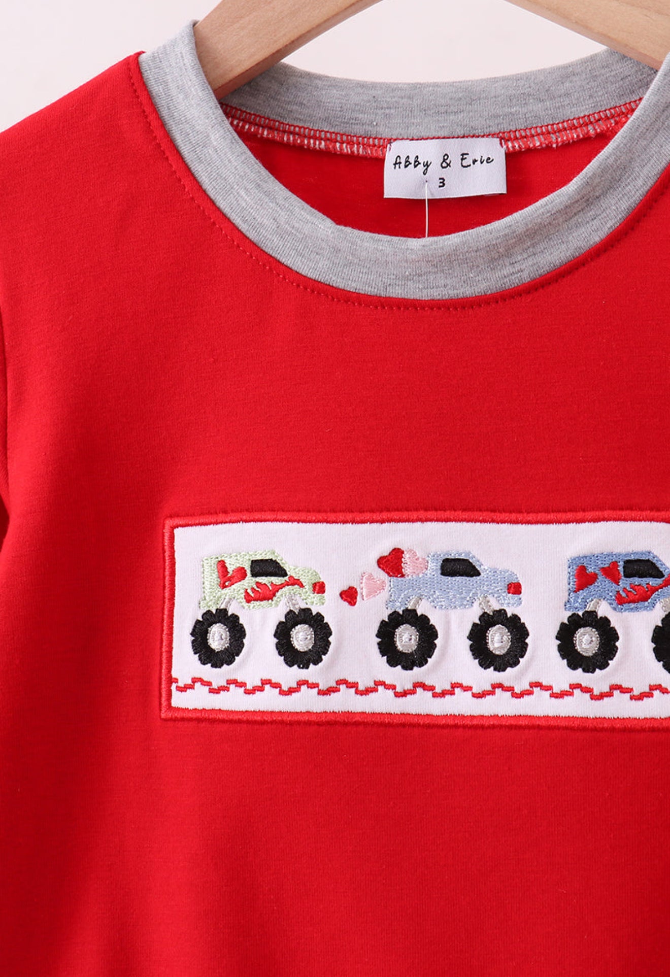 Red vehicle embroidery top