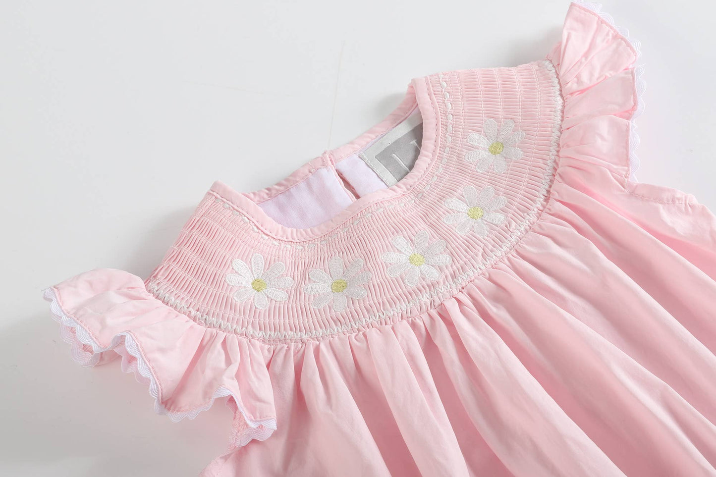 Light Pink Daisy Smocked Ruffle Romper