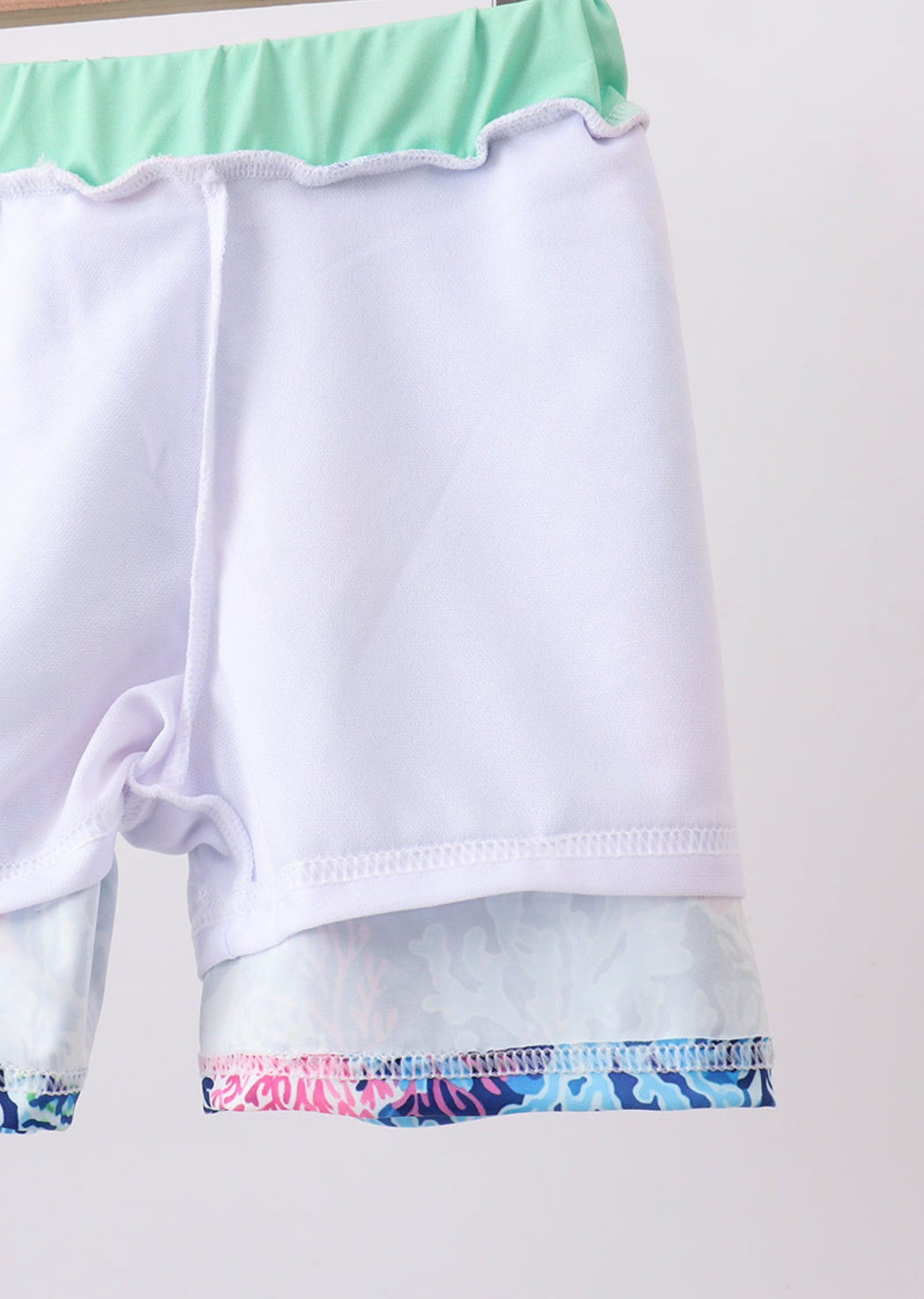 Blue marine creature print swim trunks