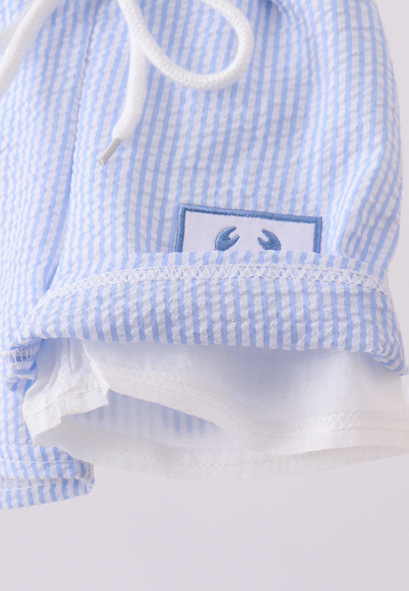 Blue stripe seersucker crab embroidery swim trunks