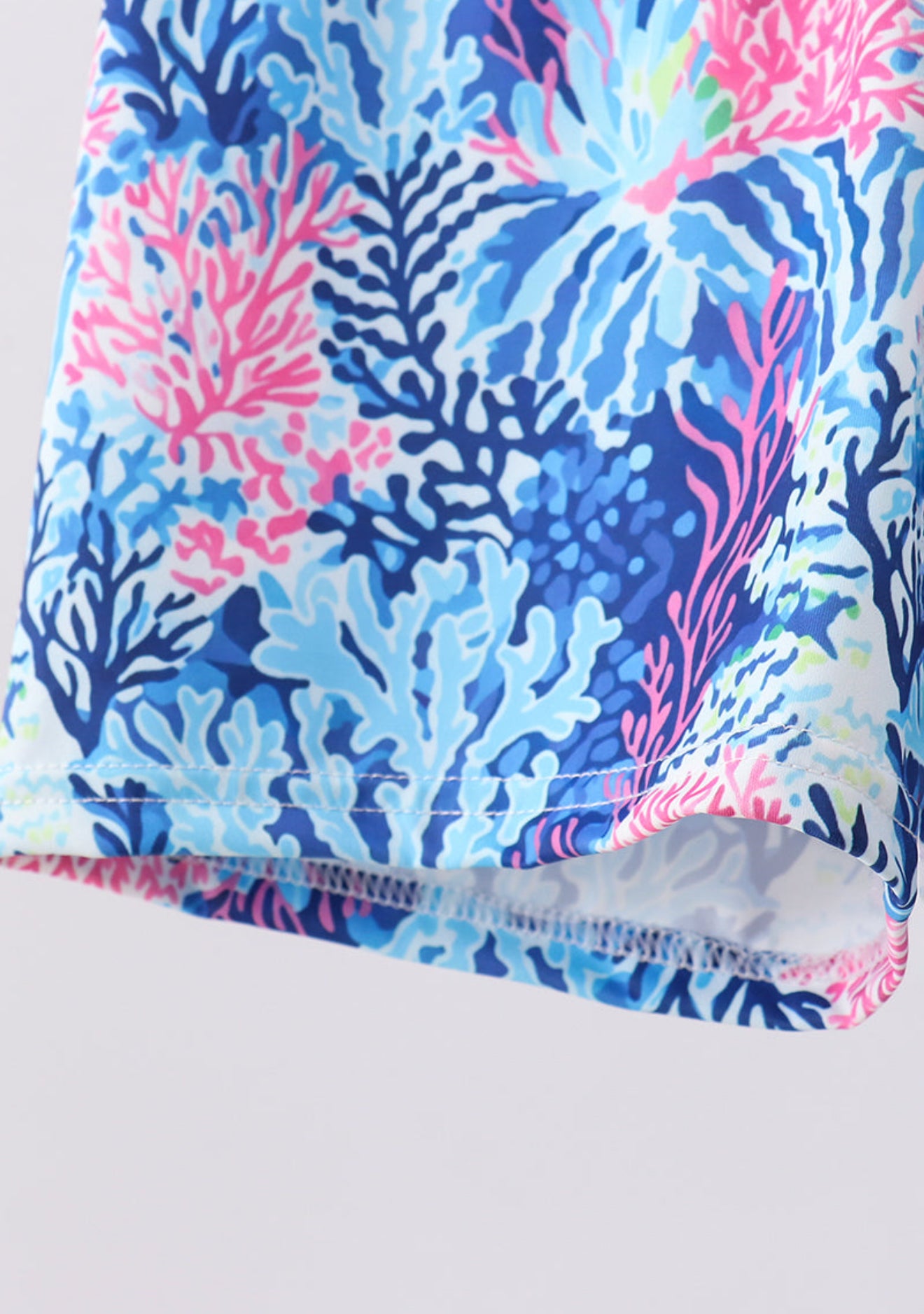 Blue marine creature print swim trunks
