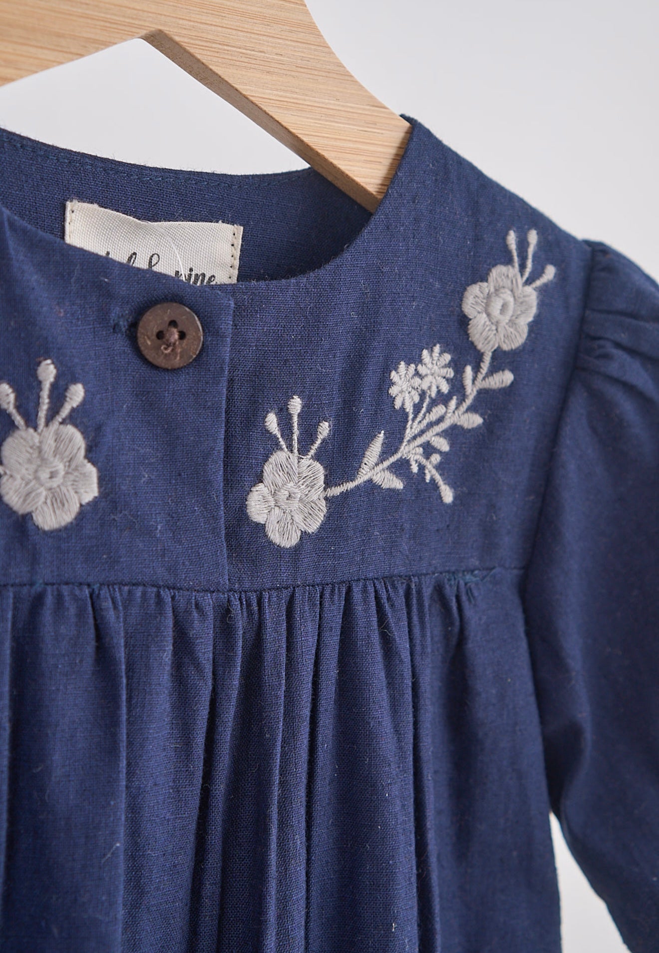 Navy floral embroidery linen girl romper