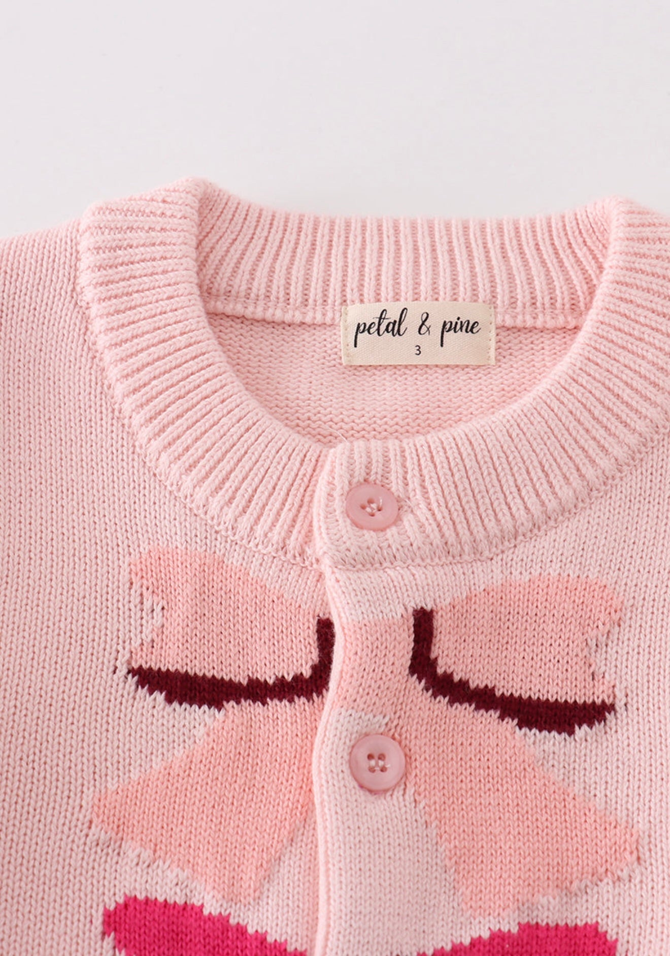 Pink bow tie cardigan sweater