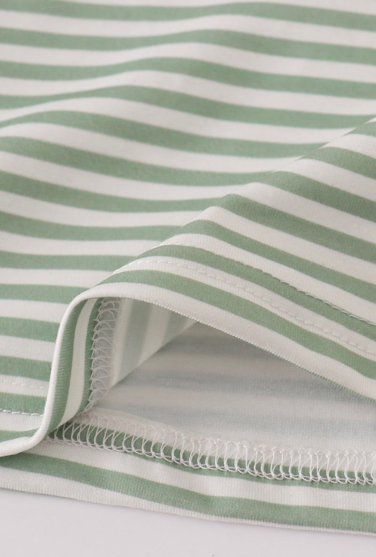 Green turkey french knot stripe top