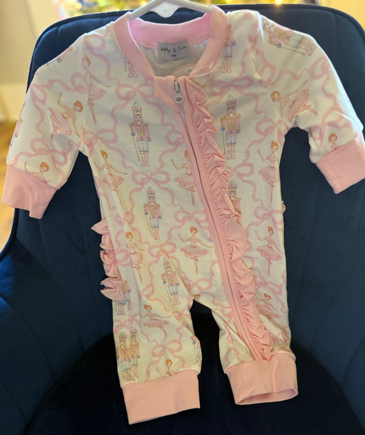 Pink nutcracker print ruffle romper