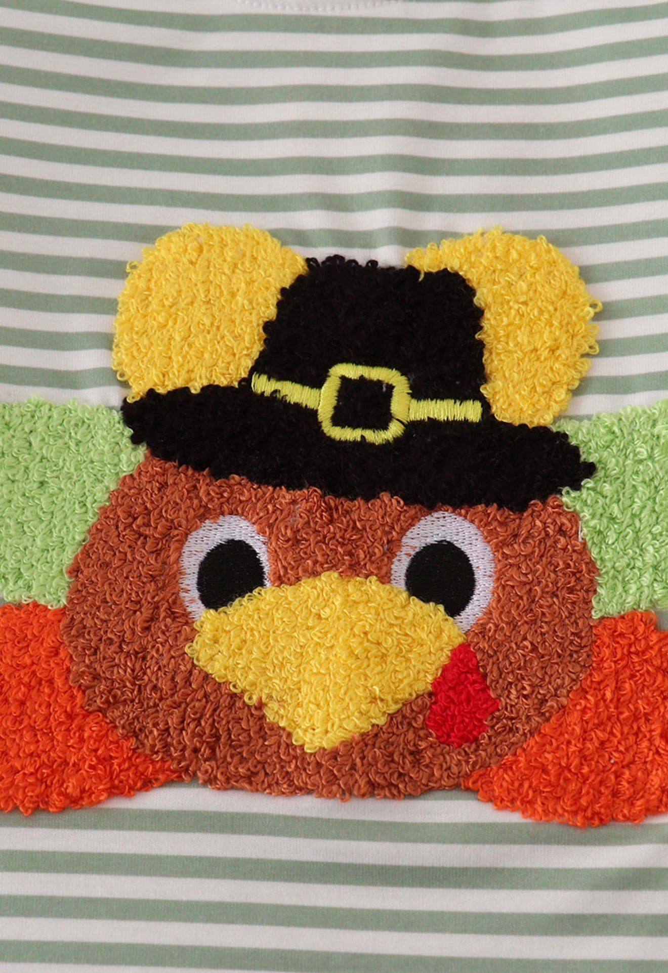 Green turkey french knot stripe top