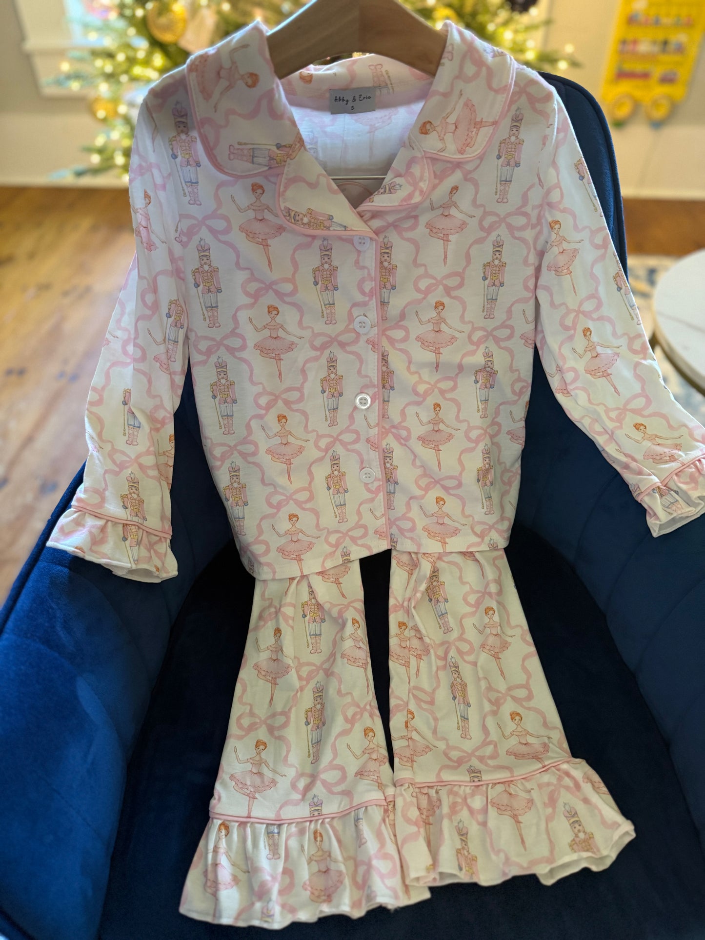 Pink nutcracker print ruffle button top pajamas set